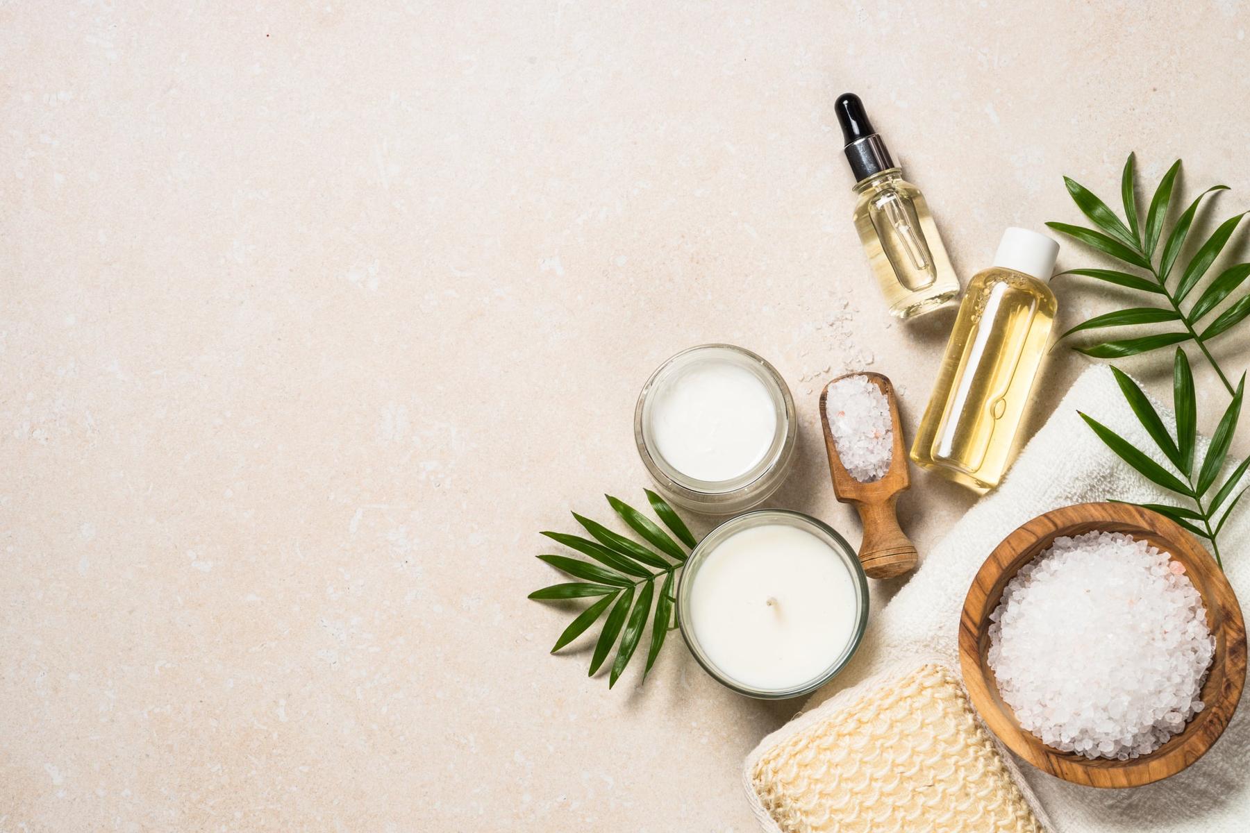 Ayurvedic oils, bath salts and botanicals on stone